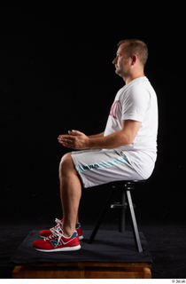  Louis  2 dressed grey shorts red sneakers sitting sports white t shirt whole body 0009.jpg